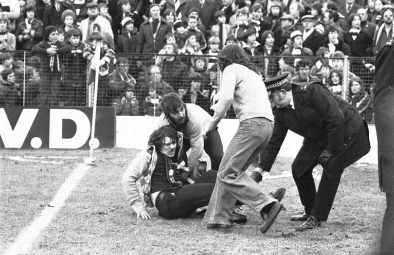 Hibs v Hearts ER March 1979 an injured fan collapses on the pitch