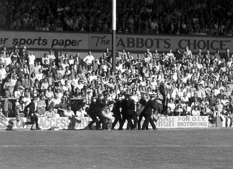 Police arrest football supporters after crowd trouble during the Hearts v Hibs Edinburgh derby match at Tynecastle in August 1978