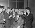 Football match cup final at Hampden - Hearts players drink champagne from the cup