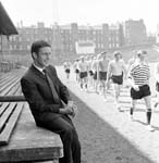 Roald Jensen watches as his team mates train at Tynecastle