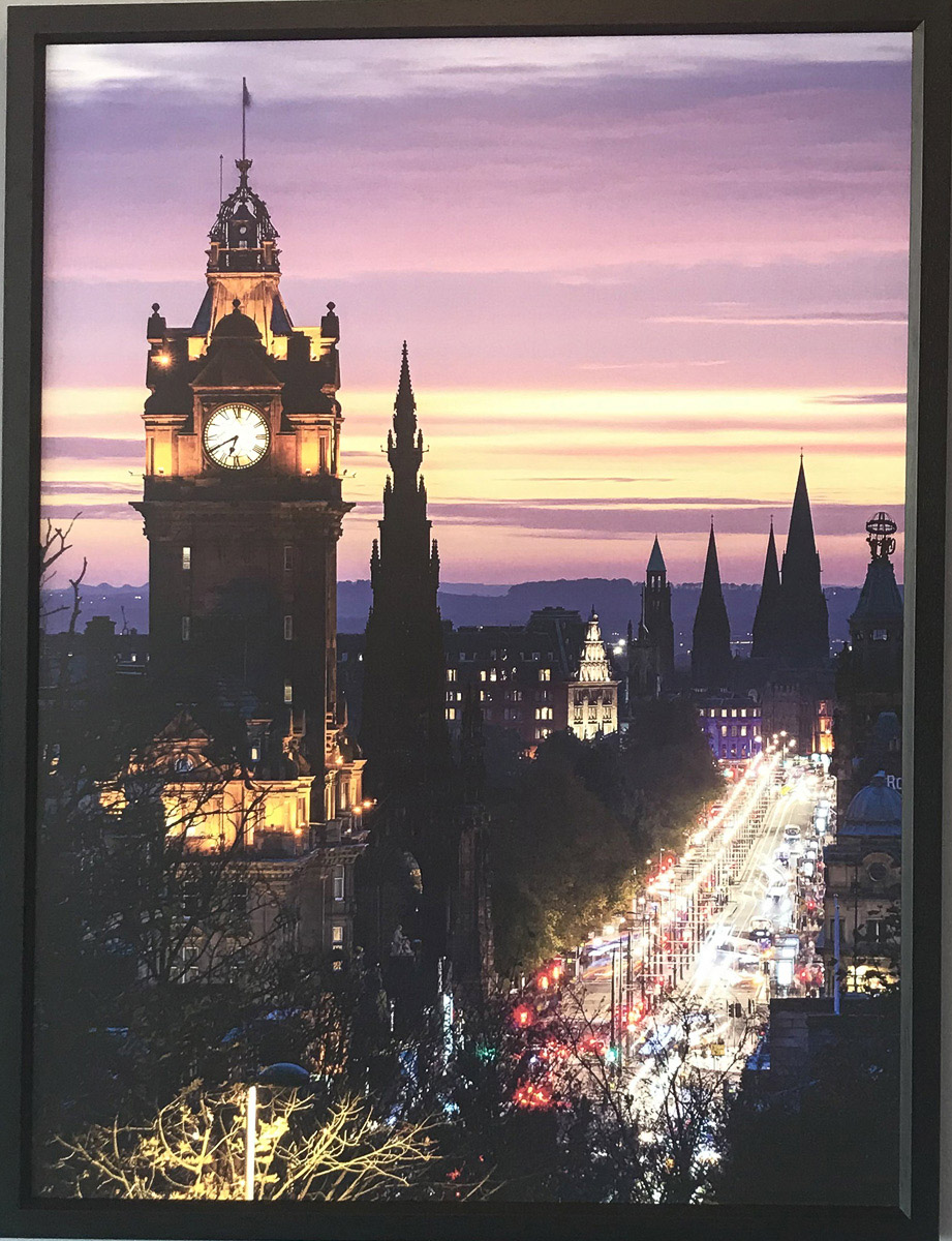 Photo of the Princes St looking west at dusk